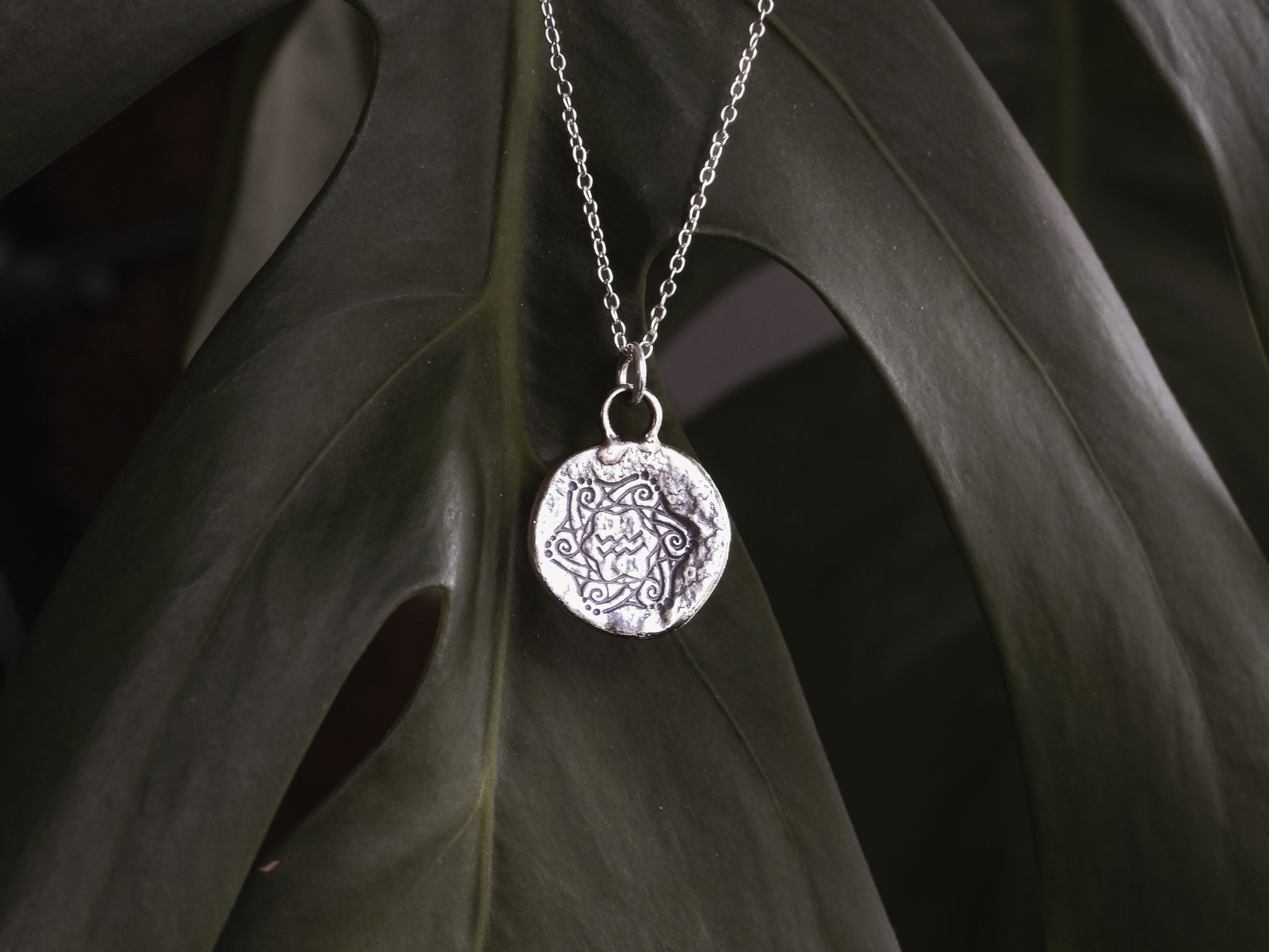 unique and boho style rustic coin aquarius pendant