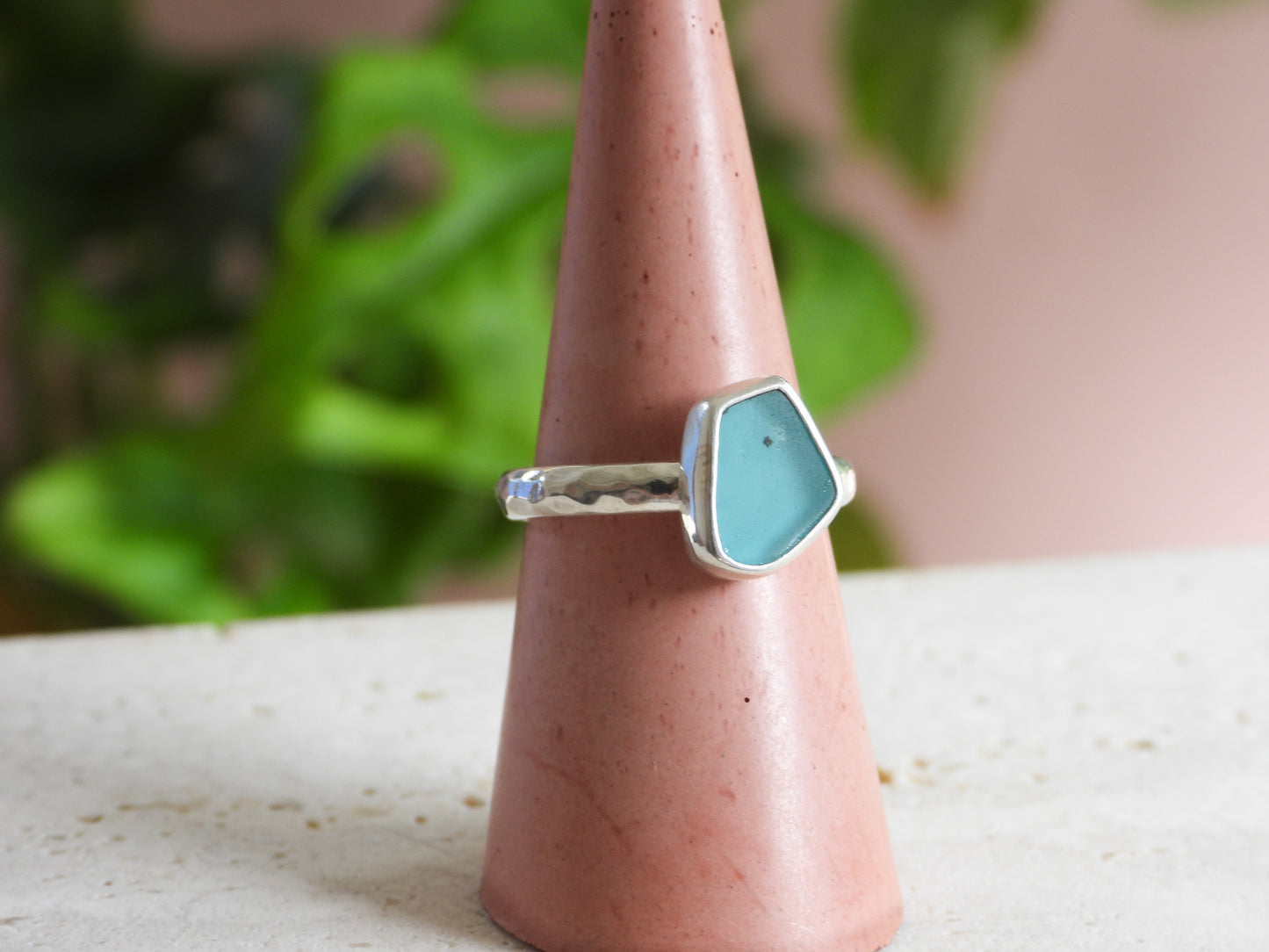 rare turquoise seaglass ring on a sterling silver hammered band