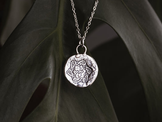 rustic aquarius star sign mandala necklace made with recycled silver