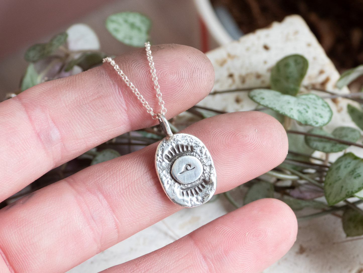 coin necklace by Ula Jewellery Cornwall with wave and textured finish
