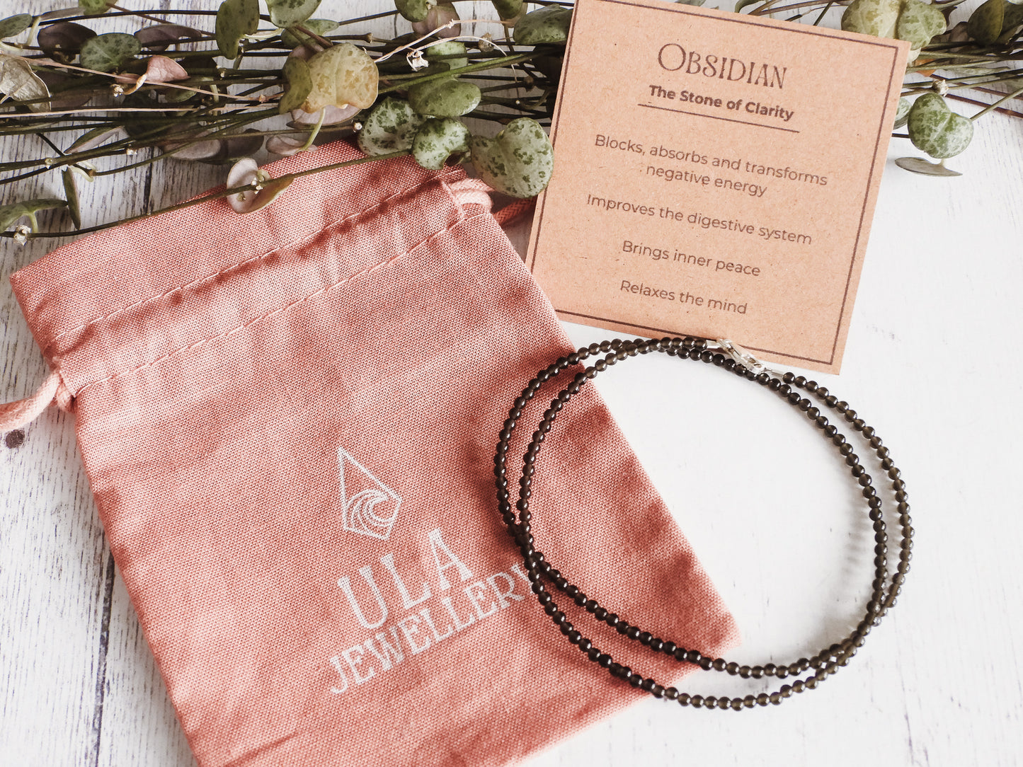 Ula Jewellery obsidian beaded necklace in gift pouch with properties card