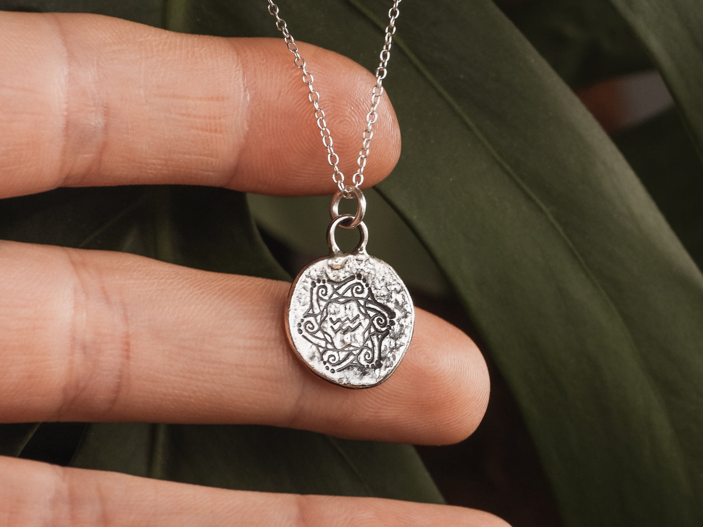 aquarius symbology jewellery with a rustic bohemian finish