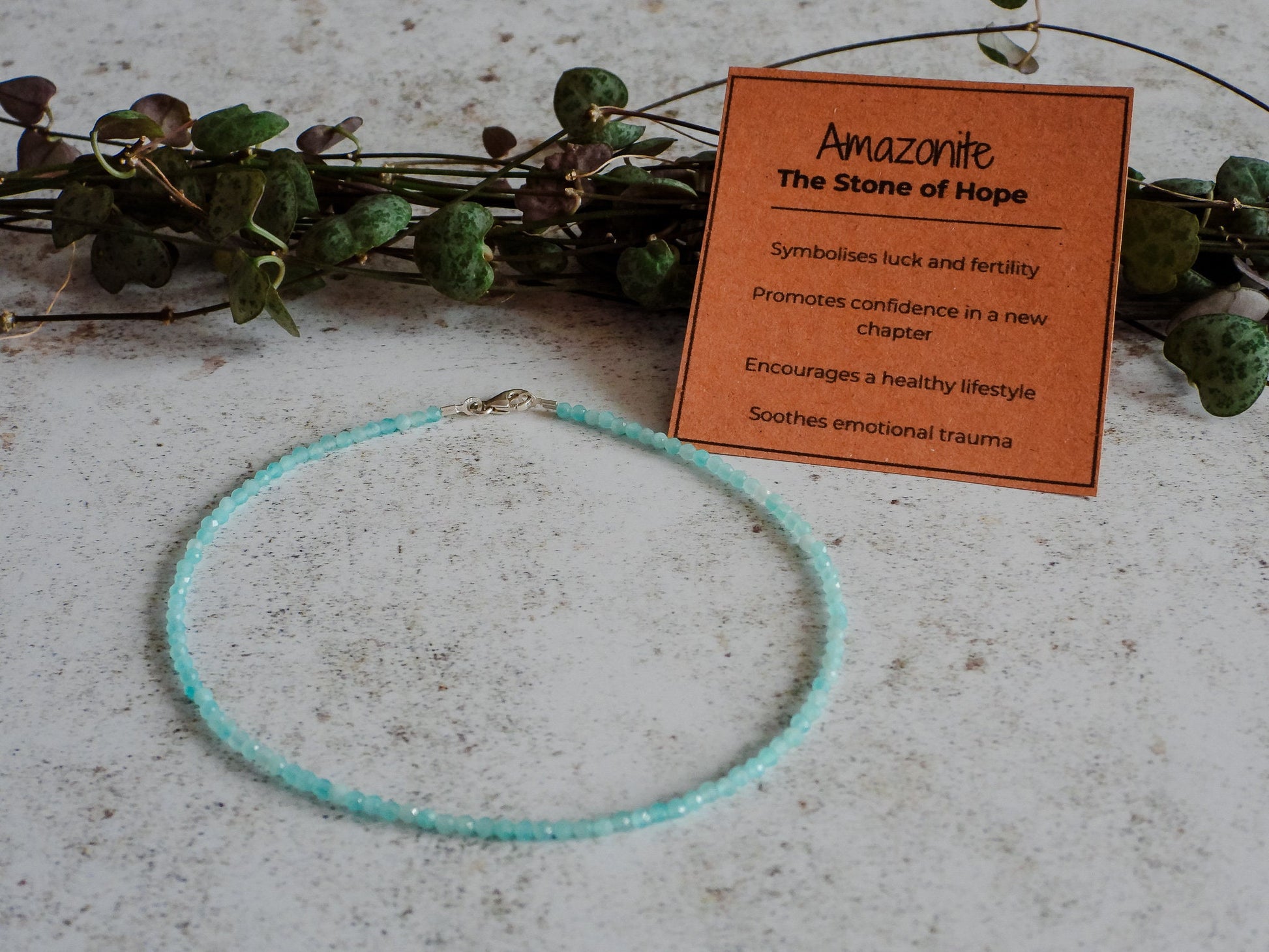 blue amazonite beaded gemstone anklet in a minimalist style