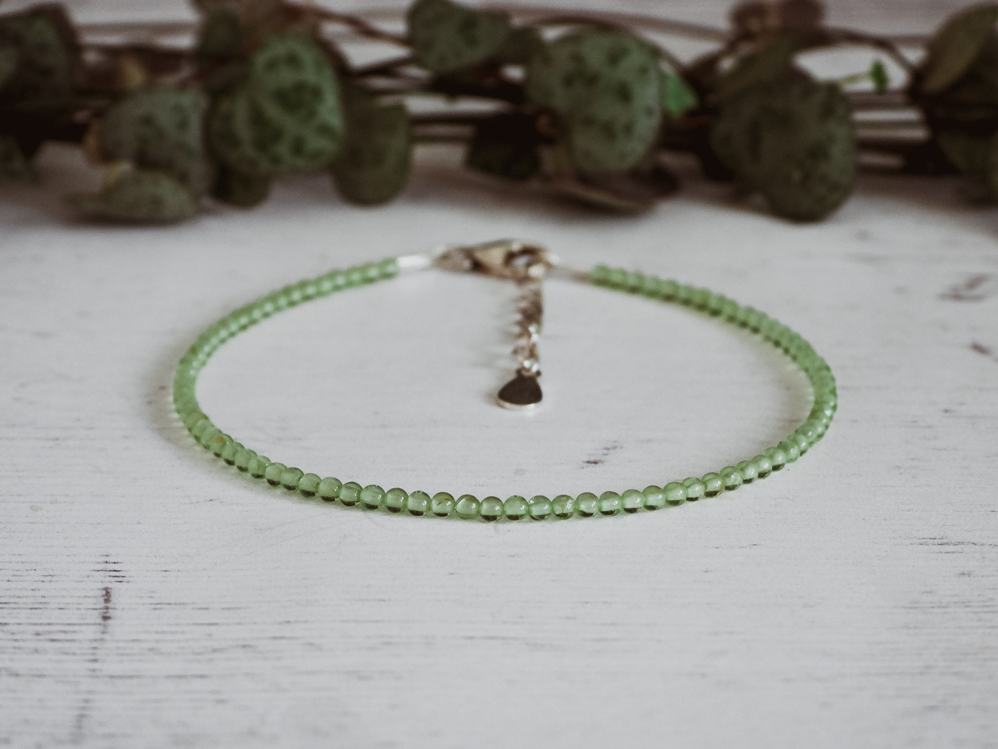 adjustable peridot gemstone beaded stacking bracelet with sterling silver clasp and chain