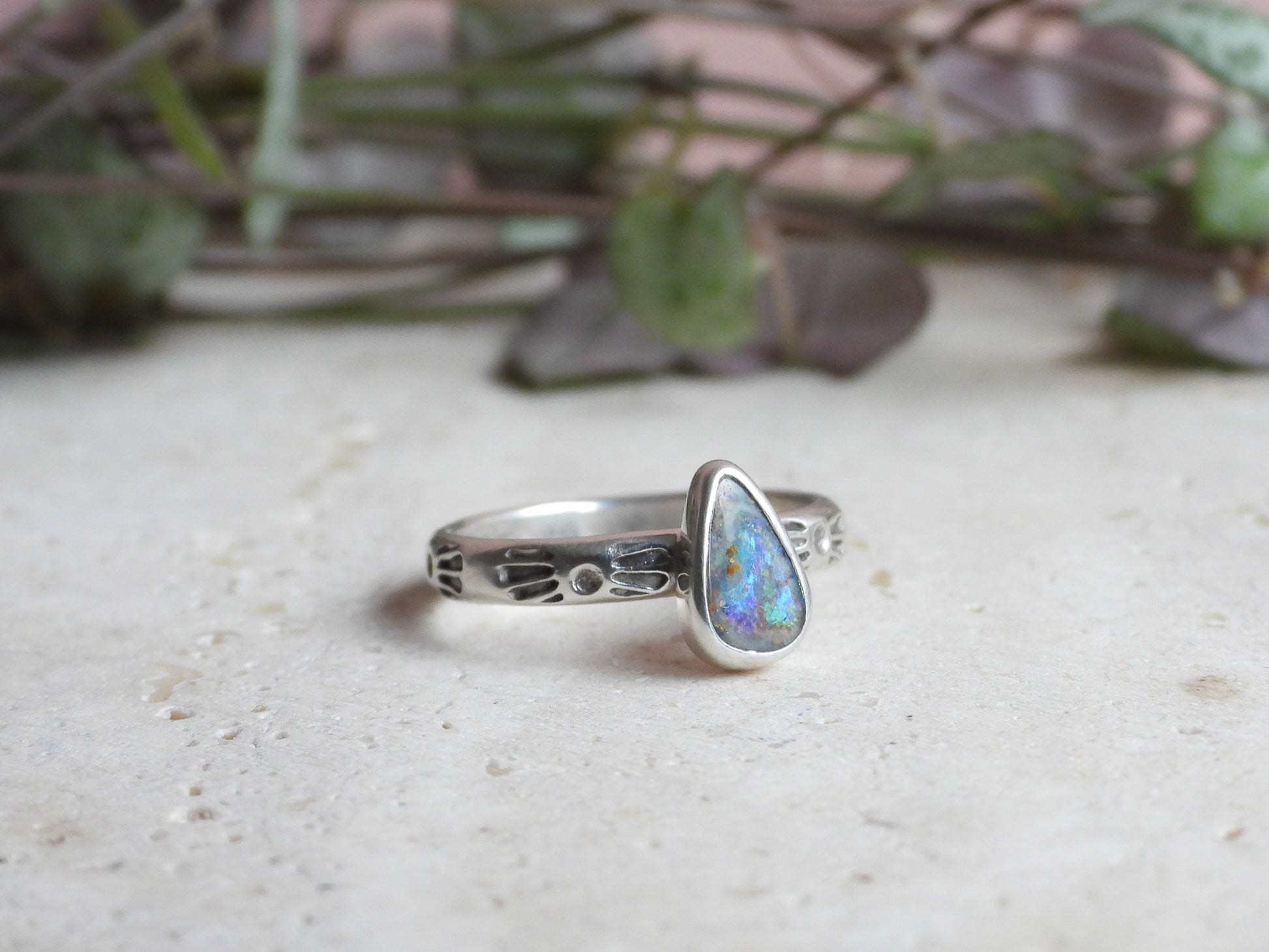 Silver ring with Australian boulder opal and textured band with boho pattern