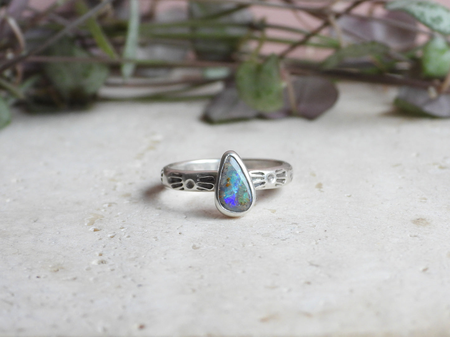 Handmade silver ring with tear drop Australian boulder opal in a unique bohemian style