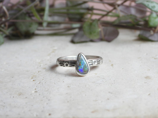 Handmade silver ring with tear drop Australian boulder opal in a unique bohemian style