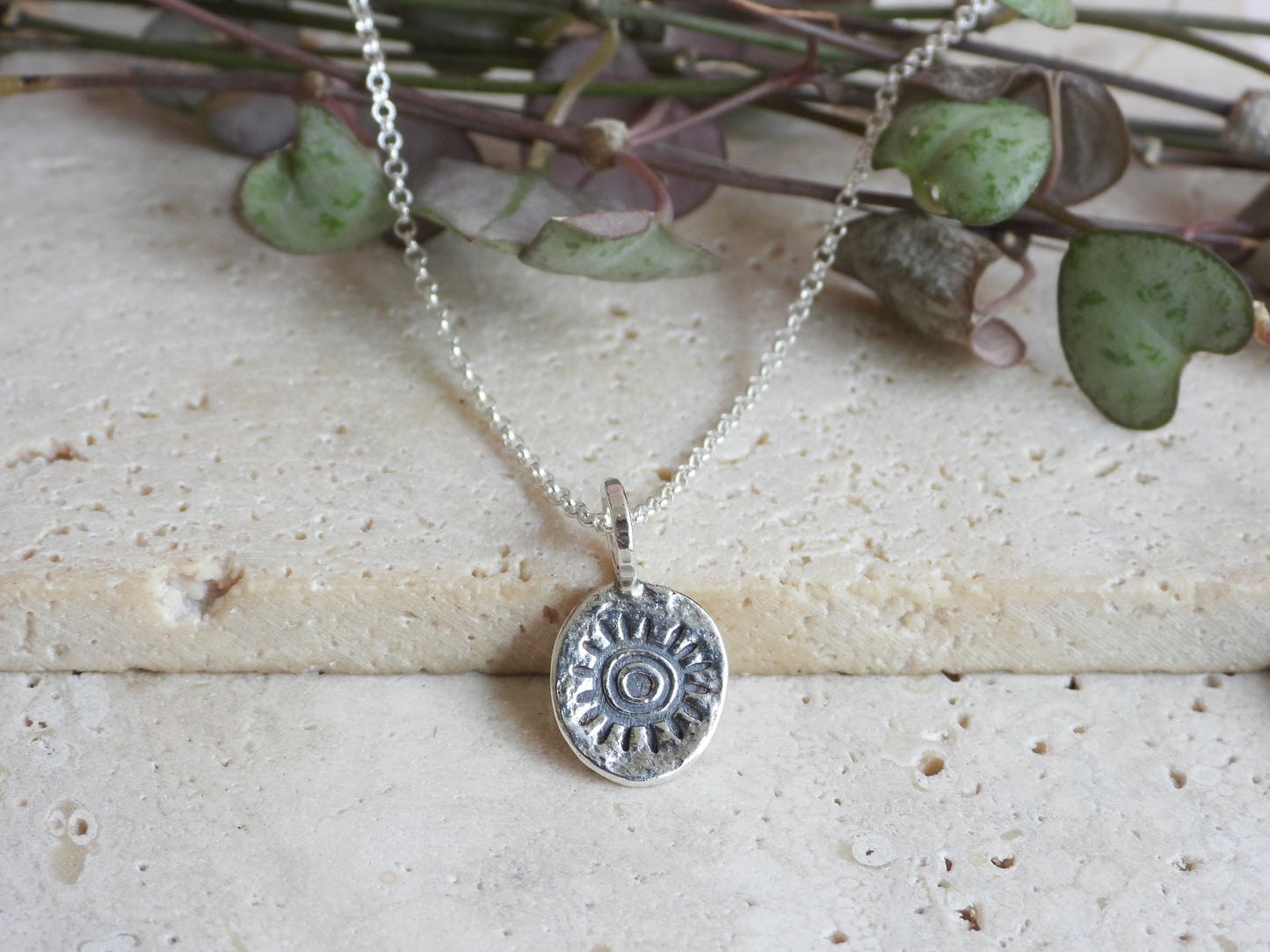 bohemian style sunshine relic charm, handmade in Cornwall with 925 silver