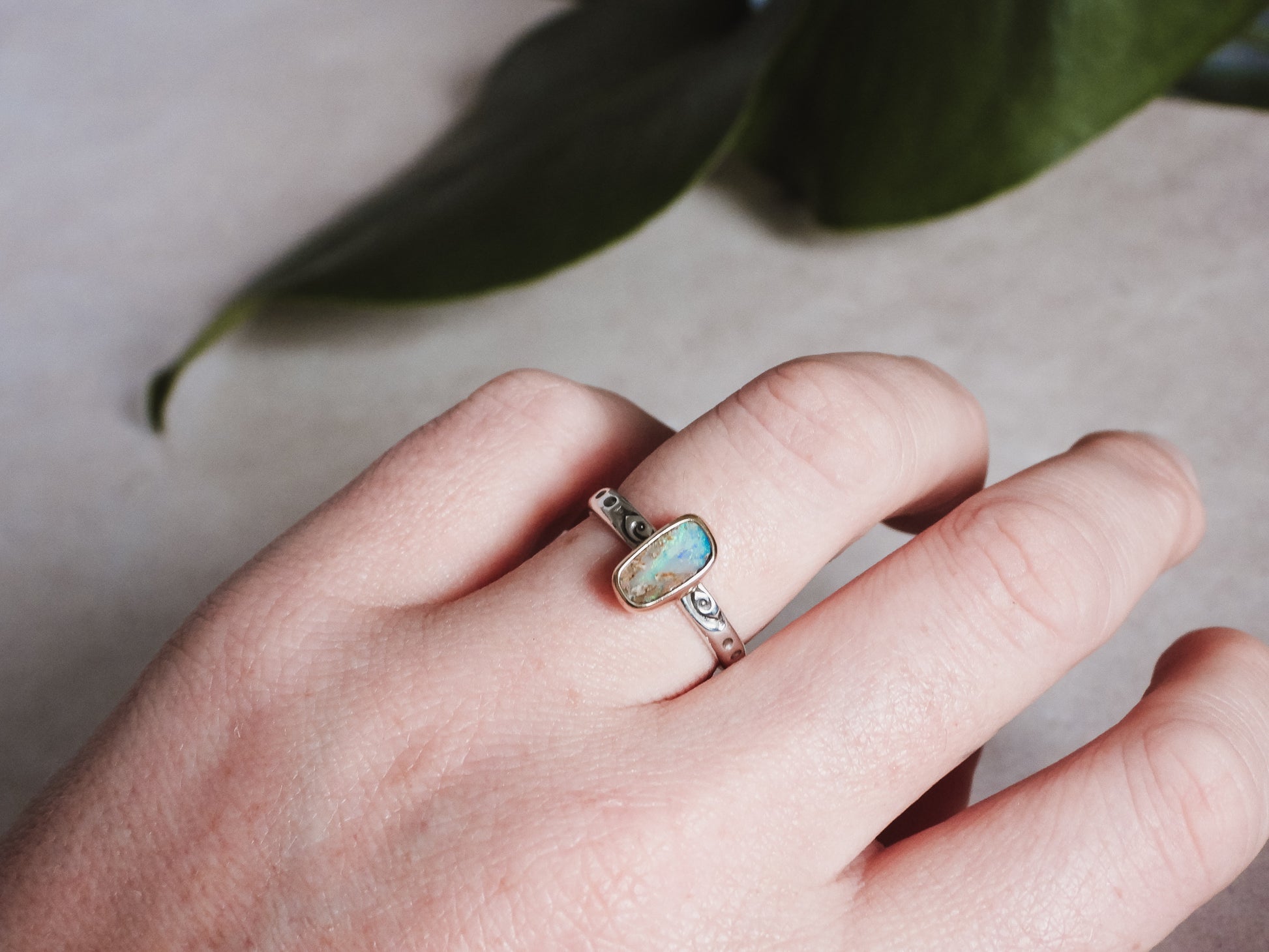 bohemian style gold and silver boulder opal ring