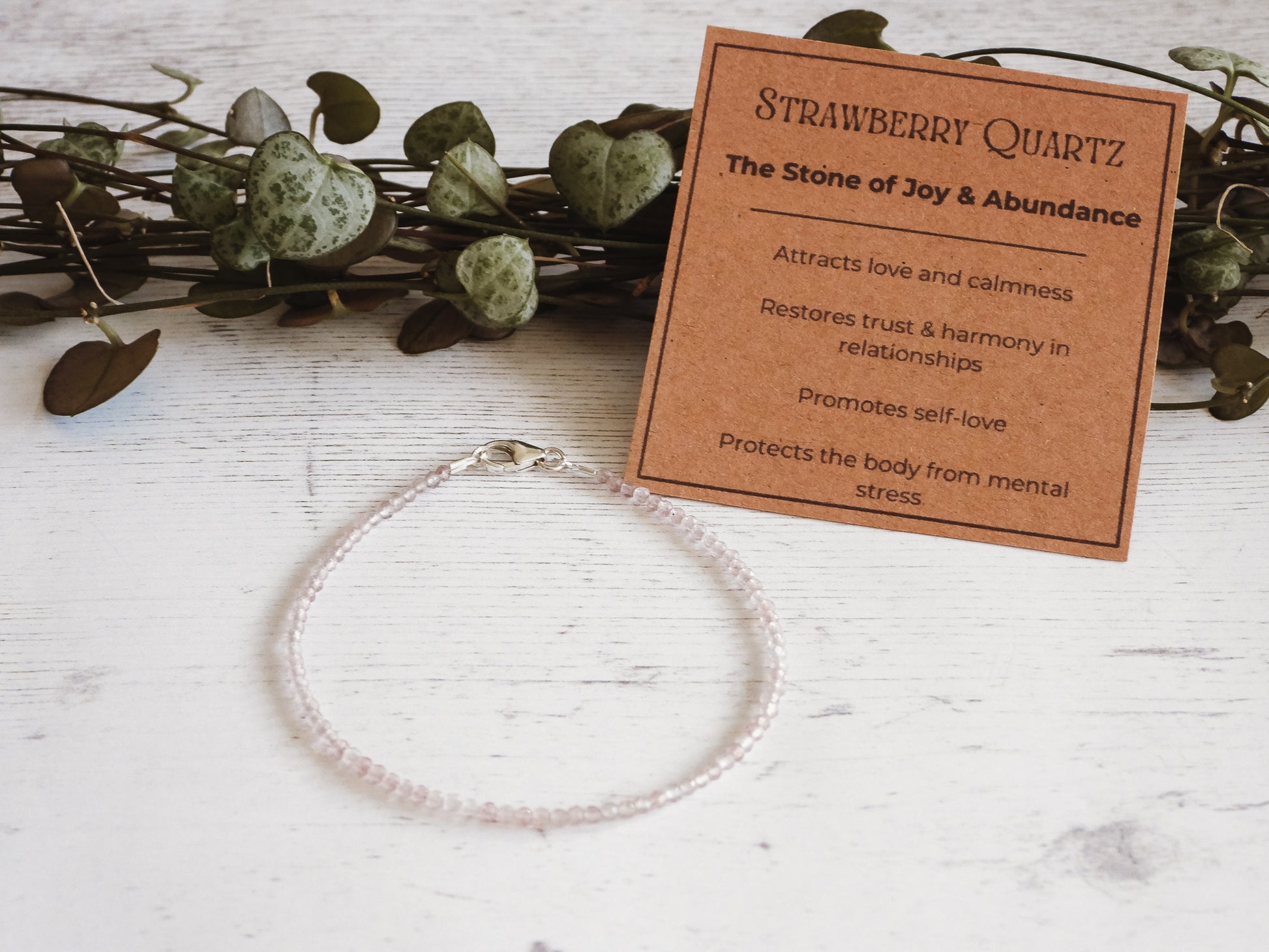 crystal healing beaded bracelet with strawberry quartz gemstone
