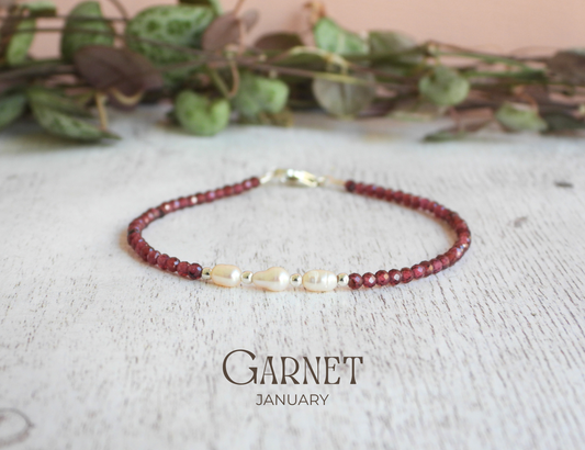 dainty garnet and freshwater pearl birthstone bracelet for January