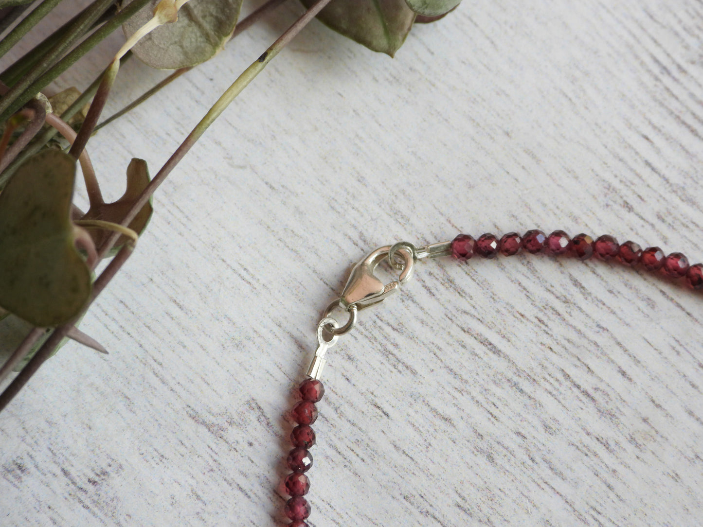 garnet gemstone and crystal bracelet with sterling silver clasp