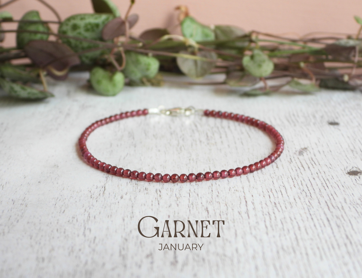 dainty garnet (January birthstone) crystal beaded bracelet with sterling silver clasp