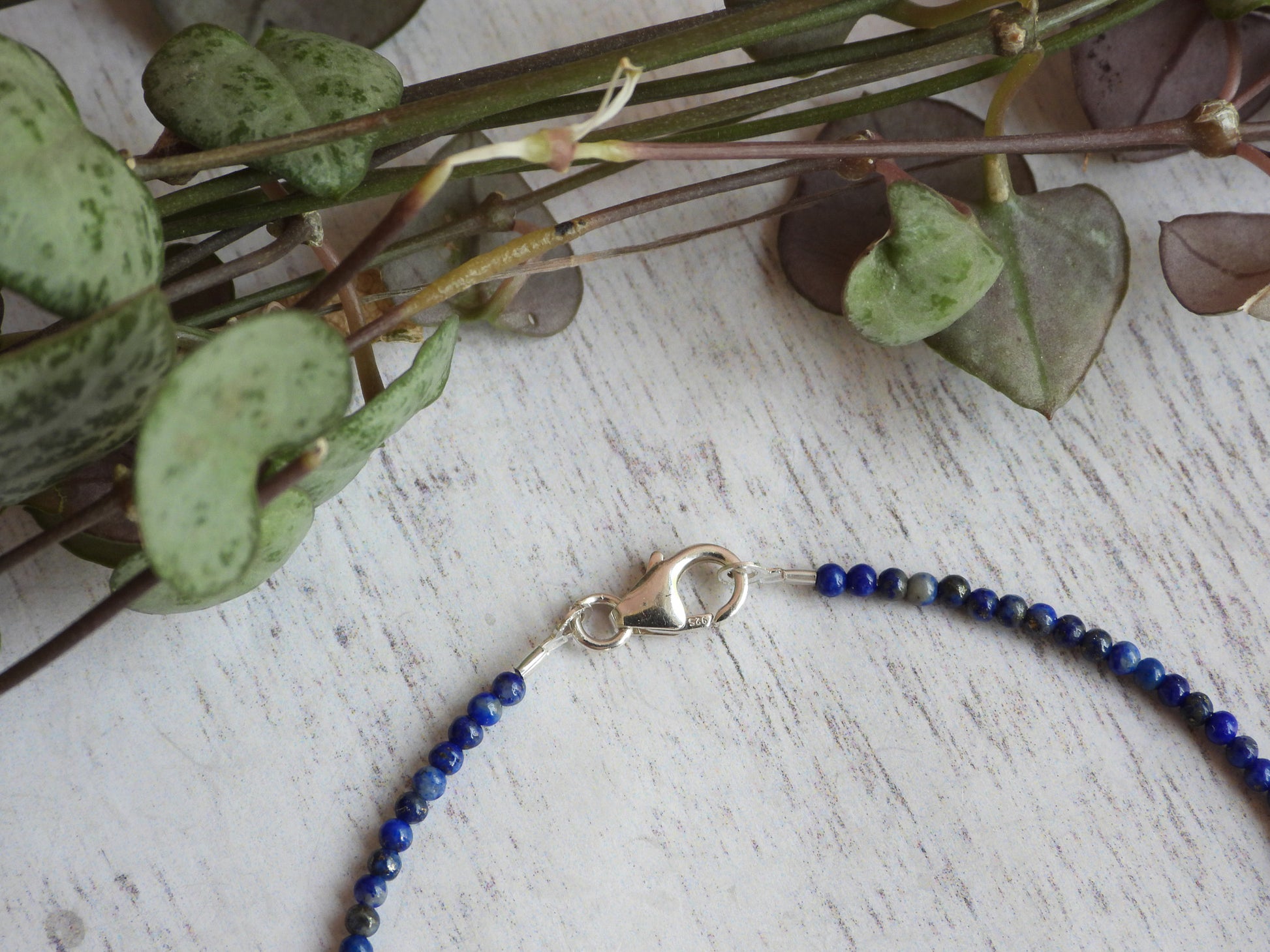 lapis lazuli gemstone bracelet with solid sterling silver clasp
