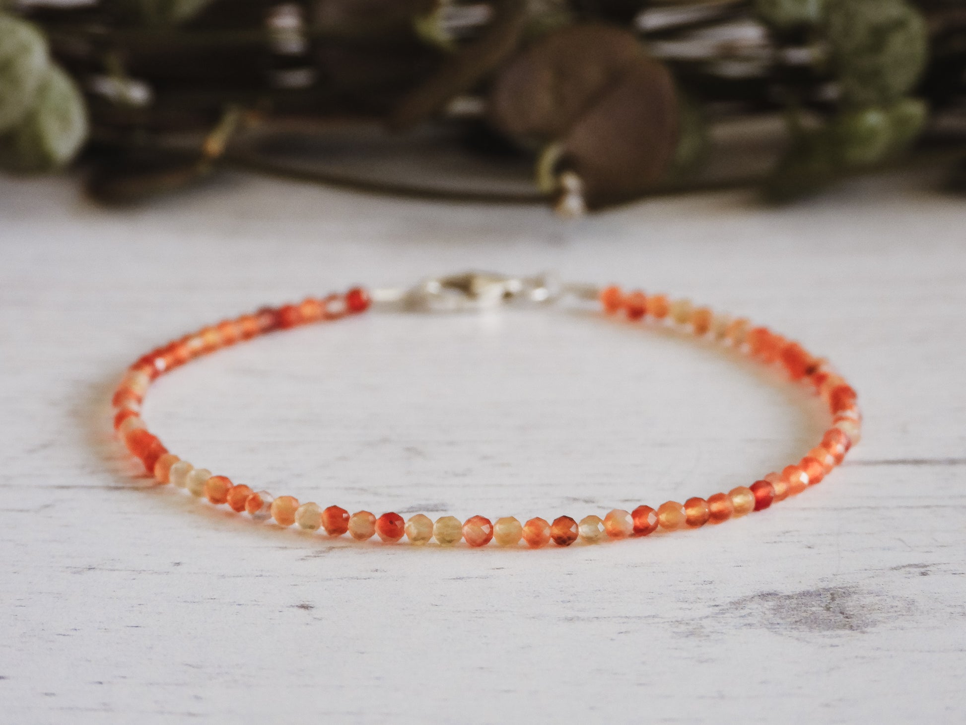 minimalist crystal healing fertility bracelet with 2mm carnelian beads