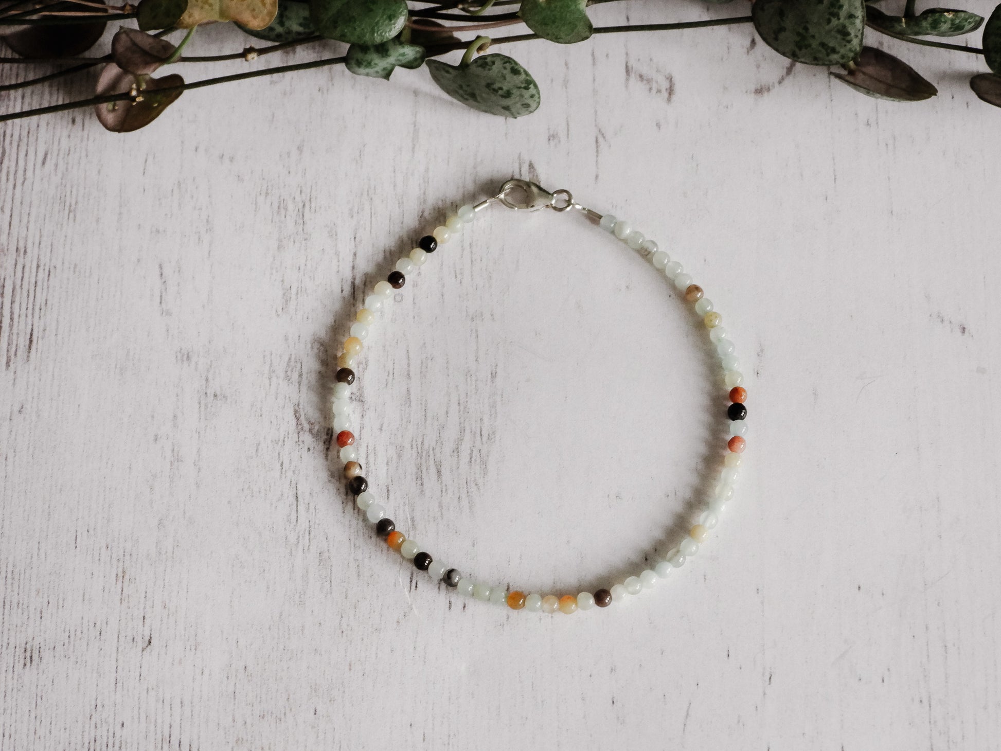 minimalist crystal healing stacking bracelet with blue green amazonite beads