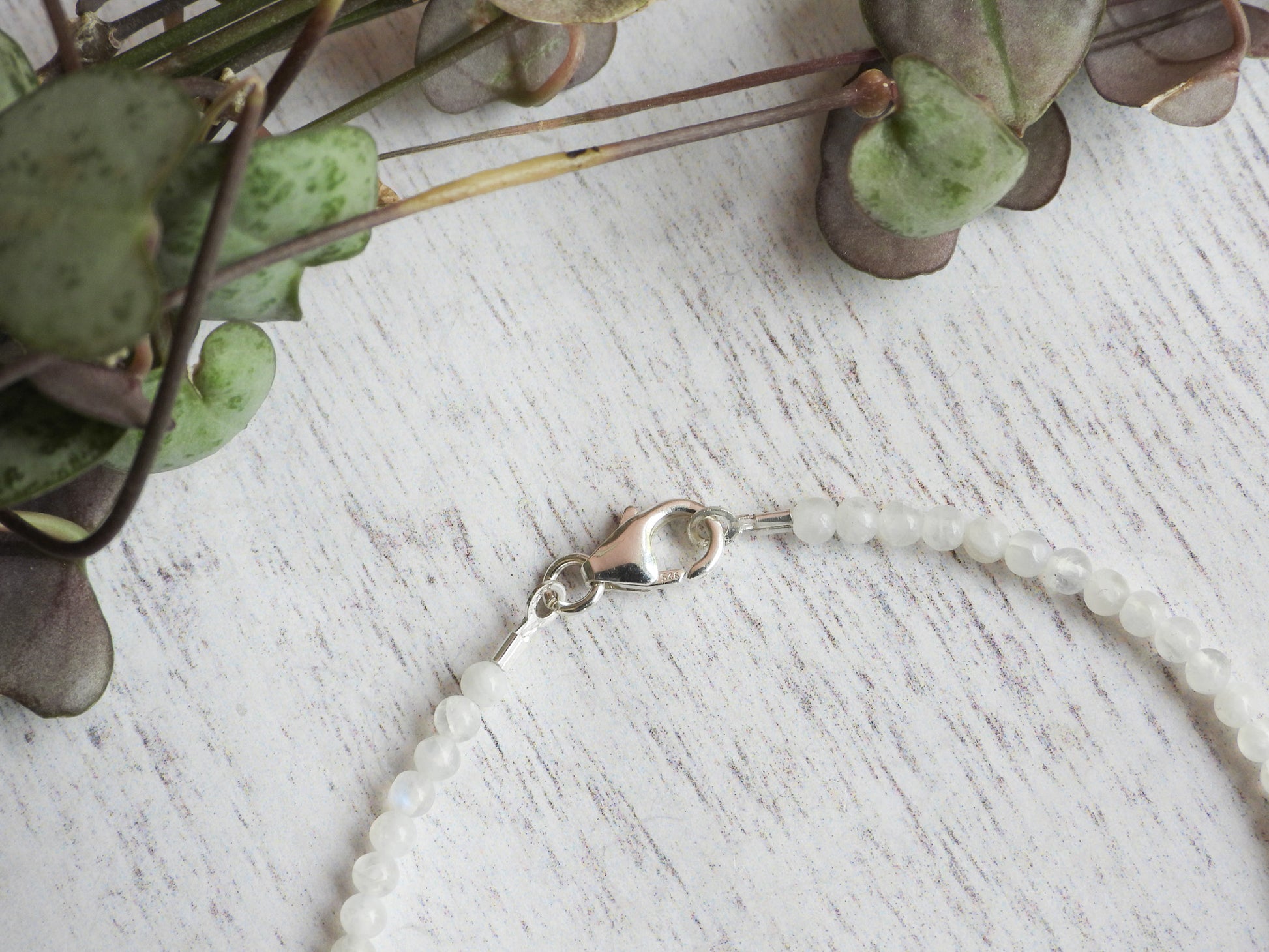 rainbow moonstone dainty beaded bracelet with sterling silver clasp