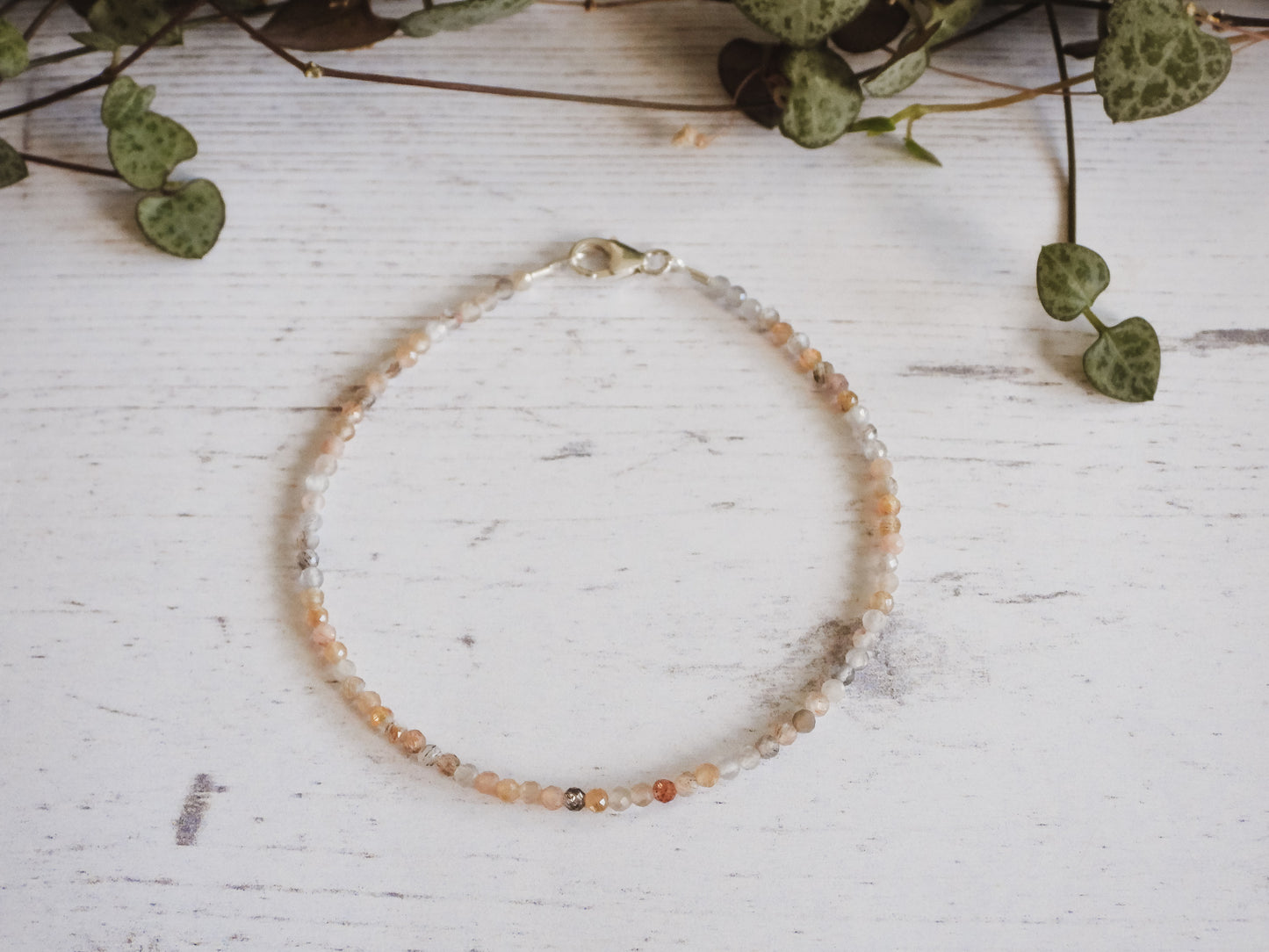dainty moonstone beaded bracelet with sterling silver clasp