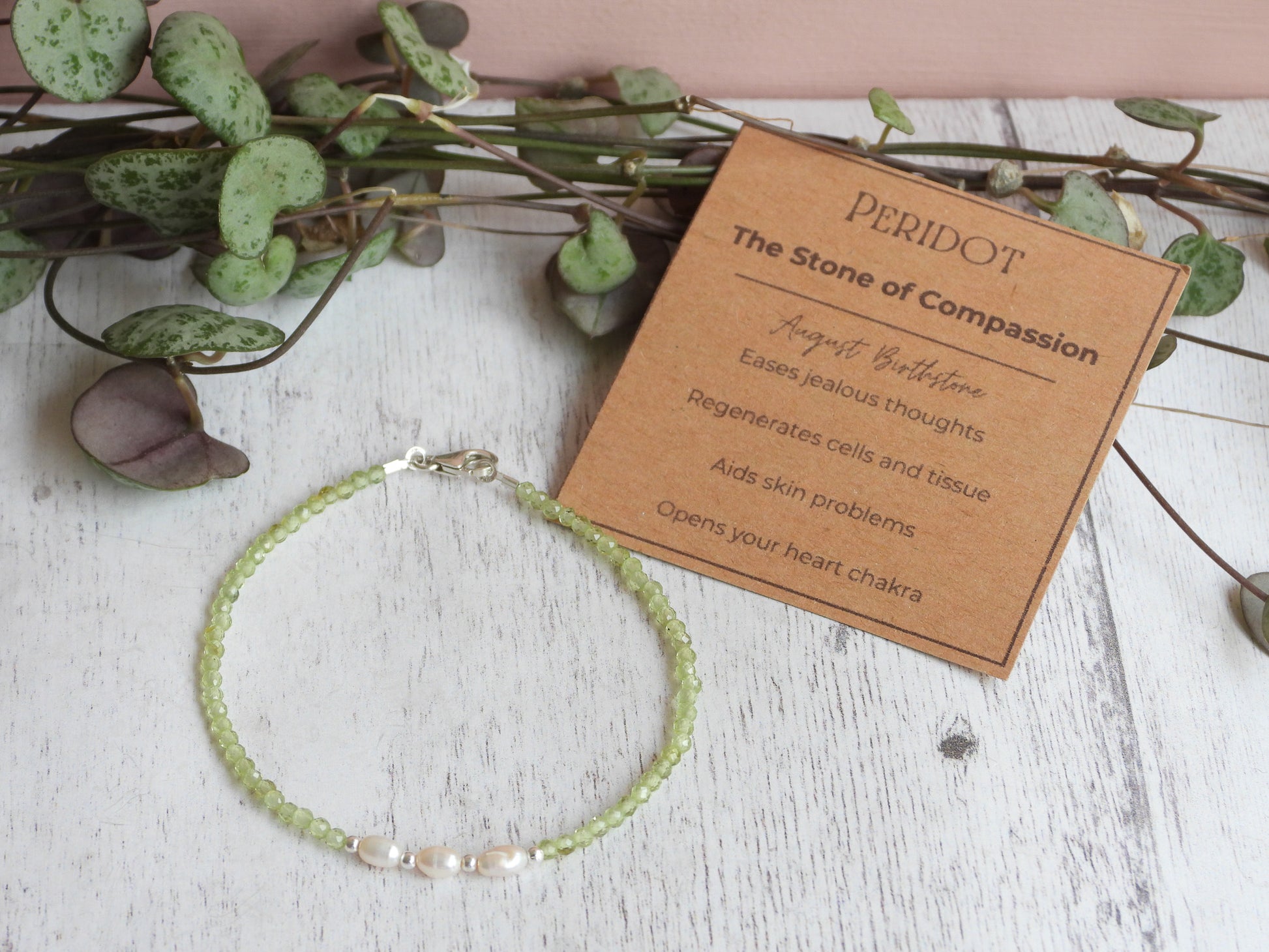 peridot crystal healing beaded bracelet with properties card