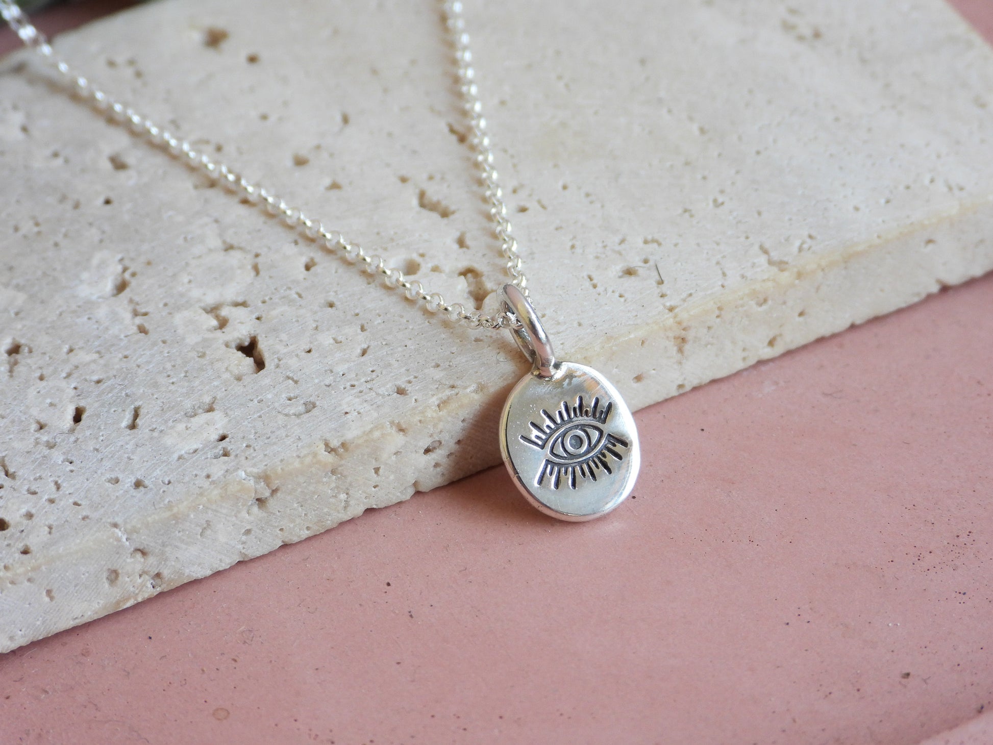 protection symbology necklace with evil eye symbol handmade and dainty
