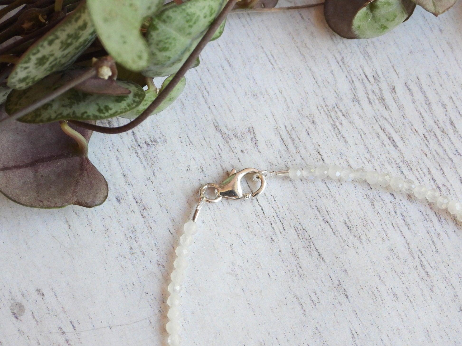 rainbow moonstone dainty beaded bracelet with sterling silver clasp