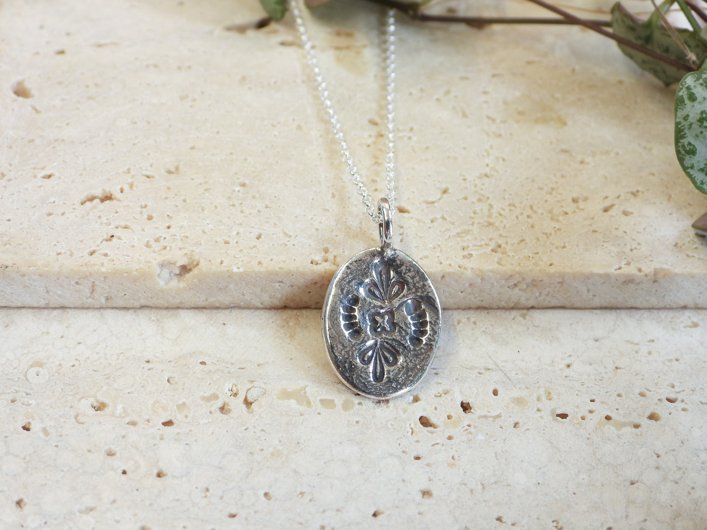 Ula Jewellery oval mandala textured charm necklace